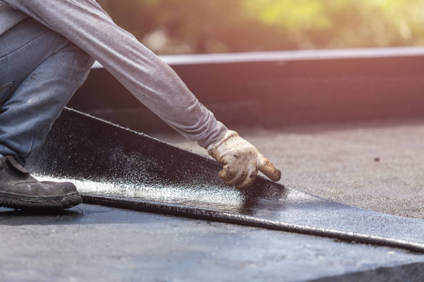 Professional Waterproofing technician working in Burlington, KY